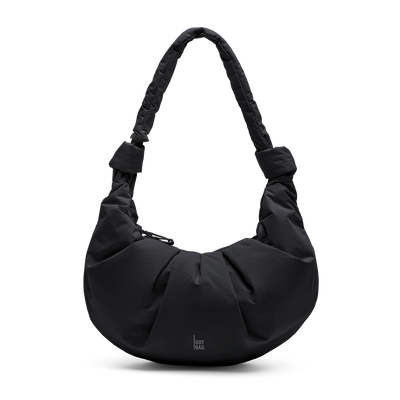 PLEAT MOON BAG LARGE bag in black (Black), studio shot, front view.
