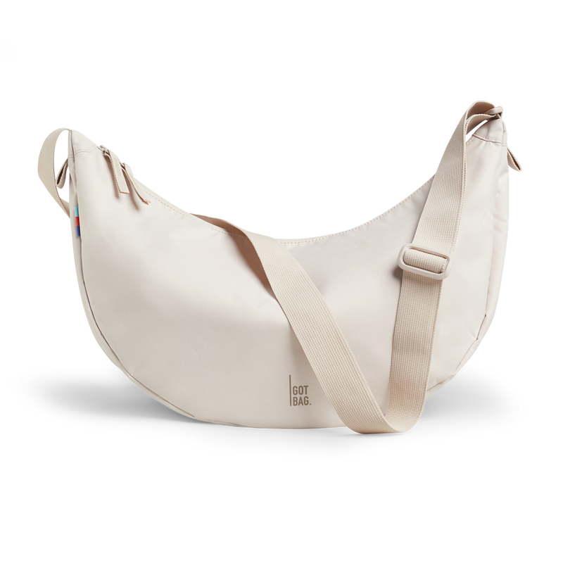 MOON BAG bag in soft shell (Warm Cream White), studio shot, front view.