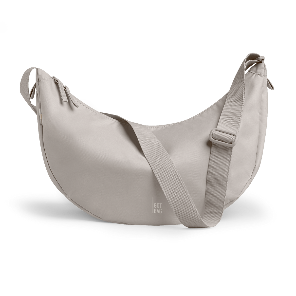 MOON BAG LARGE bag in clam (Light, Warm Gray), studio shot, front view.