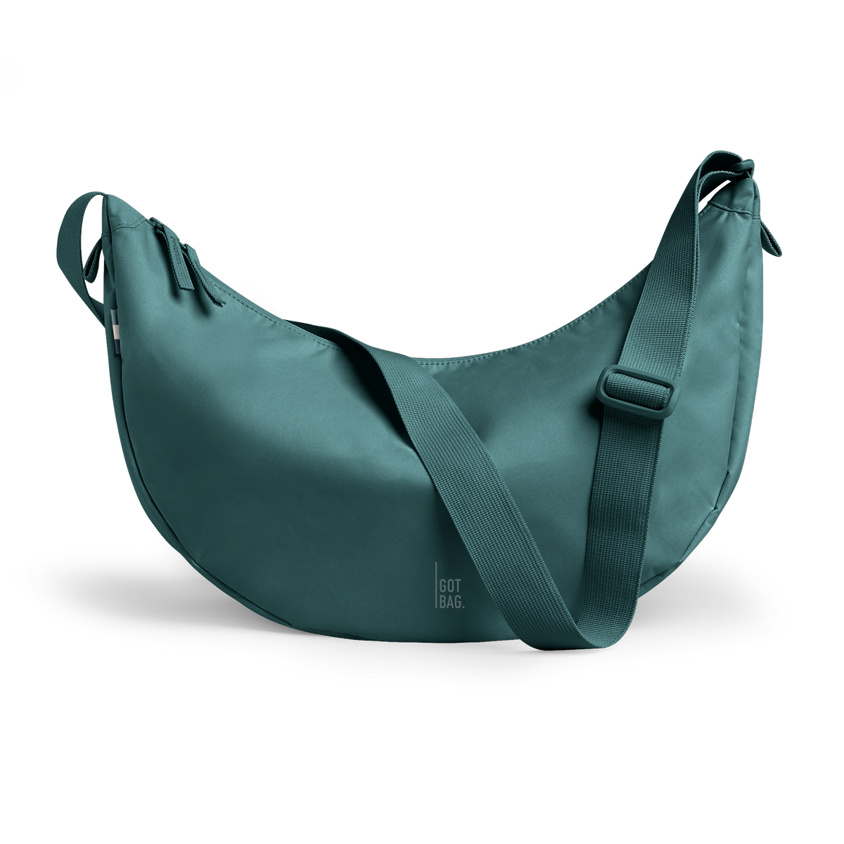 MOON BAG LARGE bag in sea teal (Cool Turquoise Green), studio shot, front view.
