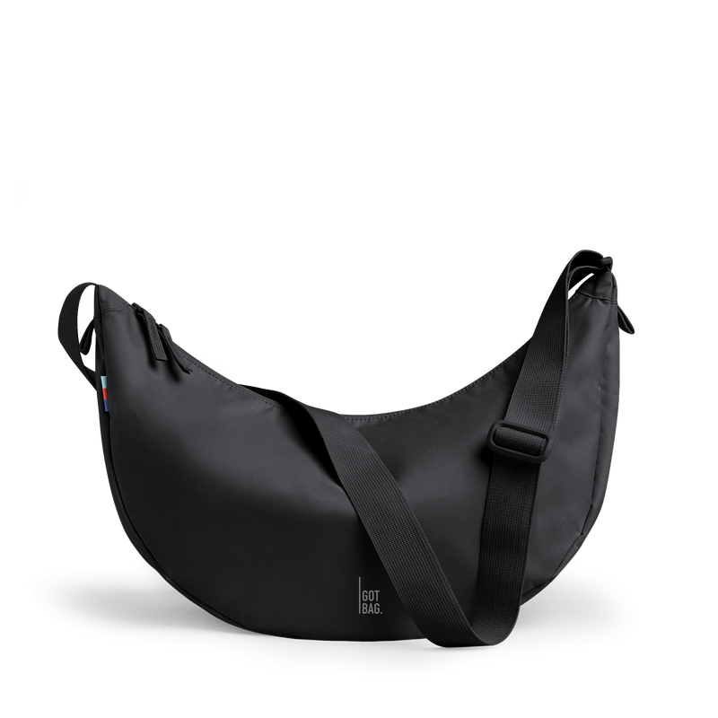 MOON BAG LARGE bag in black (Black), studio shot, front view.