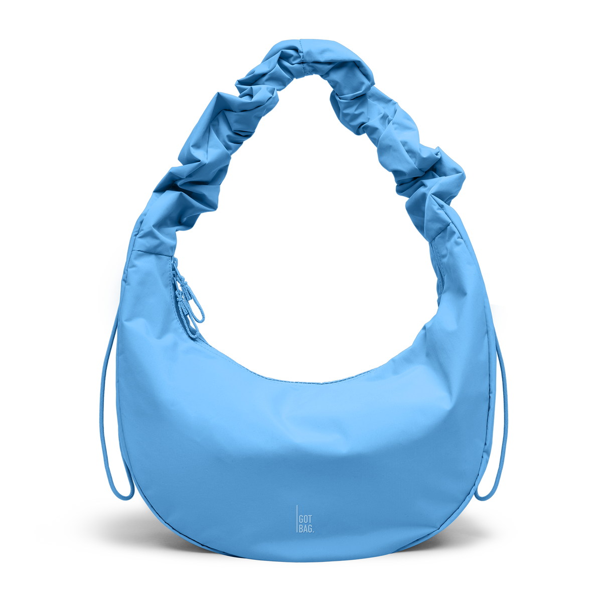 MOON BAG RUFFLE bag in aqua (Bright Light Blue), studio shot, front view.