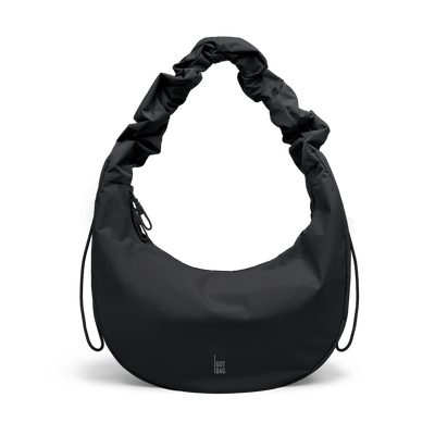 MOON BAG RUFFLE bag in black (Black), studio shot, front view.