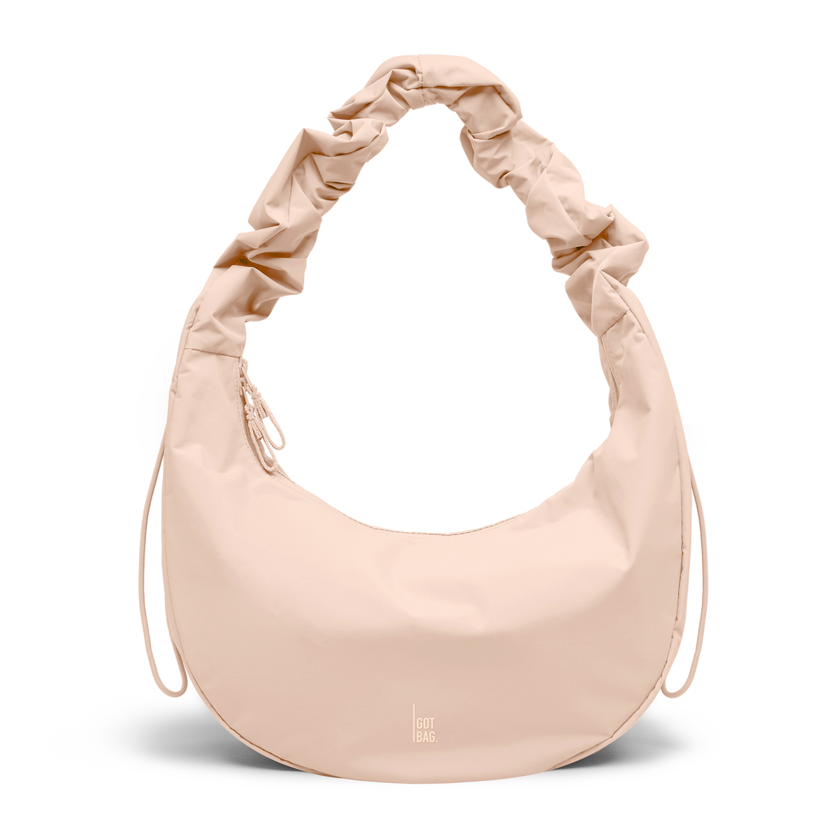 MOON BAG RUFFLE bag in pearl (Light Powder Pink), studio shot, front view.