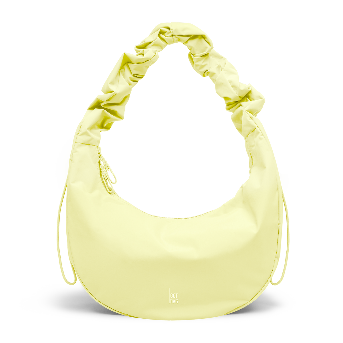 MOON BAG RUFFLE bag in sea lemon (Soft Pastel Yellow), studio shot, front view.
