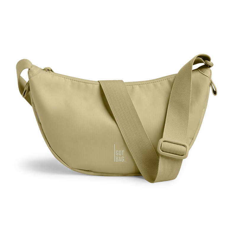 MOON BAG SMALL bag in nori (Pastel Pistachio Green), studio shot, front view.