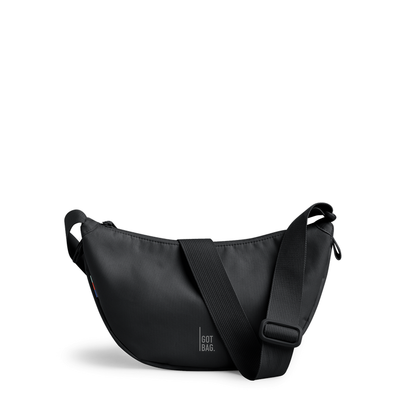 MOON BAG SMALL bag in black (Black), studio shot, front view.