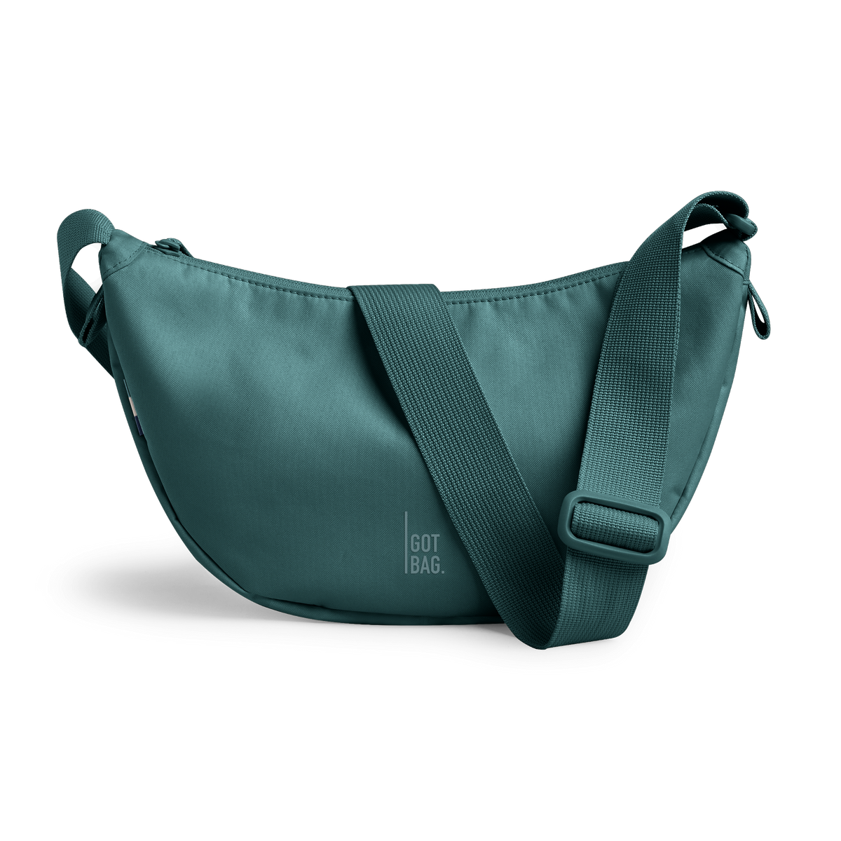 MOON BAG bag in sea teal (Cool Turquoise Green), studio shot, front view.