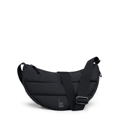 PUFFER MOON BAG SMALL bag in black (Black), studio shot, front view.