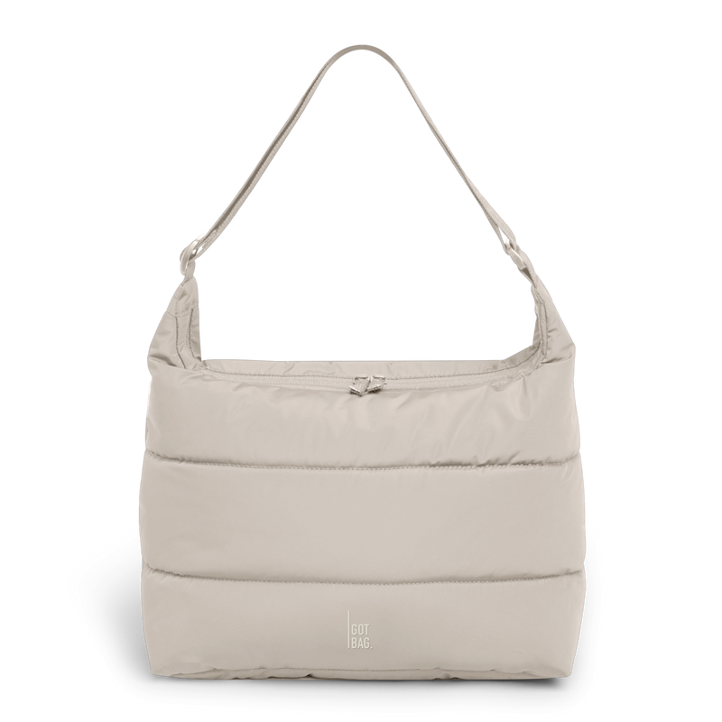 PUFFER SQUARE BAG bag in scallop (Light Beige), studio shot, front view.