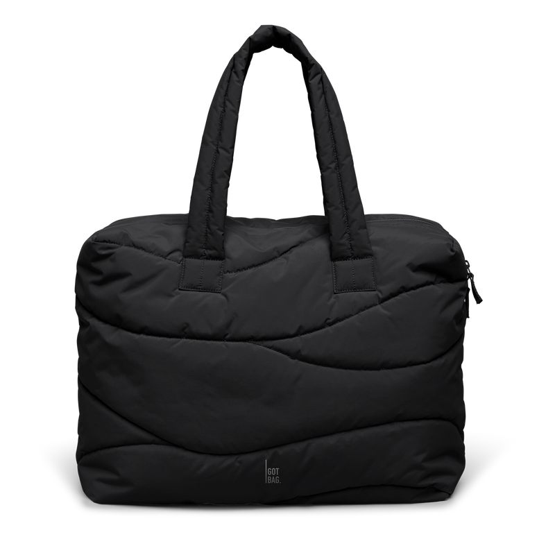 WAVY PUFFER EVERYDAY BAG bag in black (Black), studio shot, front view.