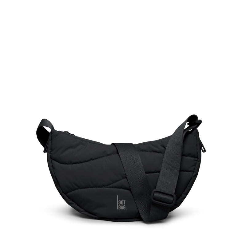 WAVY PUFFER MOON BAG bag in black (Black), studio shot, front view.